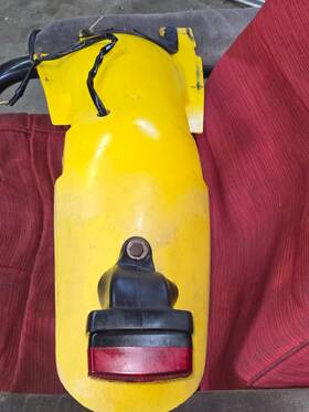 63111-03400-25y Suzuki 1996 Ds80 Rear Fender With Tailight Oem 1 Crack