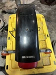 2009 1999-2010 Suzuki GZ250 Rear Wheel Fender Black With Turn Signals. Fixed Price $89.00.