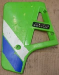 Kawasaki KX125 1986-87 Oem Left Side Radiator Shroud 49089-1065 4FL. Fixed Price $175.00.