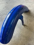 03-17 Victory Vegas Nos Oem New Front Fender 1013831-1231 Blue W/ Pearl Nib. Fixed Price $125.00.