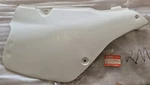47111-27C00-30H RM125 1991 / 1992 Genuine Suzuki White Right Hand Frame Cover. Fixed Price $94.19.