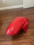 2003-2008 Suzuki SV650 Front Fender Red Good Condition. Fixed Price $50.00.