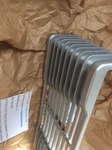 Suzuki GT750 74-77 Lmab Nos Radiator Cover / Grille Pt 17761-31200-126 New + Tag. Fixed Price $666.29.