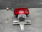 1994 Suzuki Intruder VS1400 Rear Taillight Assembly Brake #11226. Fixed Price $75.00.