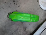 06-08 Kawasaki KX450F Oem Front Wheel Fender. Fixed Price $21.00.