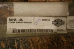 New Genuine Harley Davidson Fender Support Bracket 60198-06. Fixed Price $29.95.