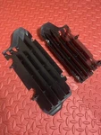 2022 Suzuki RMZ250 (oem) Radiator Guards (pair). Fixed Price $22.39.