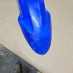 2013 Blue Yamaha XT250 Front Fender Damaged. Fixed Price $25.00.