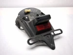 10-23 Honda VT750 Shadow Phantom Rear License Plate Bracket 80101-MFEA-6700. Fixed Price $63.61.